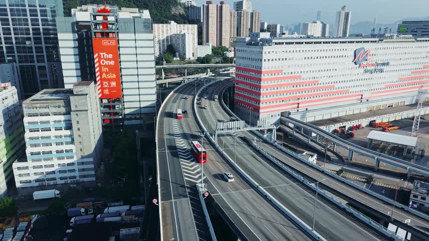 Elevated highways with light traffic between tall buildings in an urban area