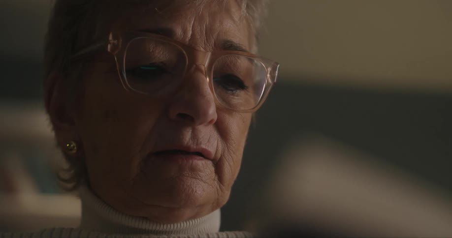 A woman sitting in a room talking