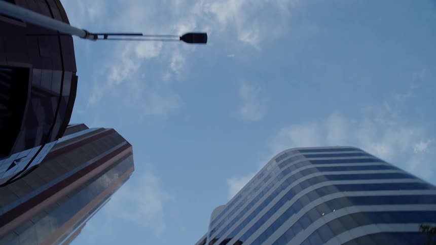 A view of some tall buildings in a city