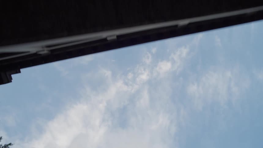 A view of the sky near some buildings in a city