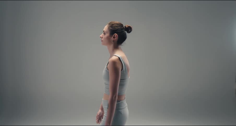 A woman walking in a room