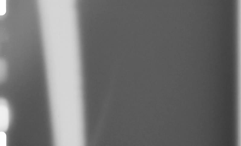 White paint in an animation slowly shifts in tone turning black after a few seconds creating a stark visual contrast
