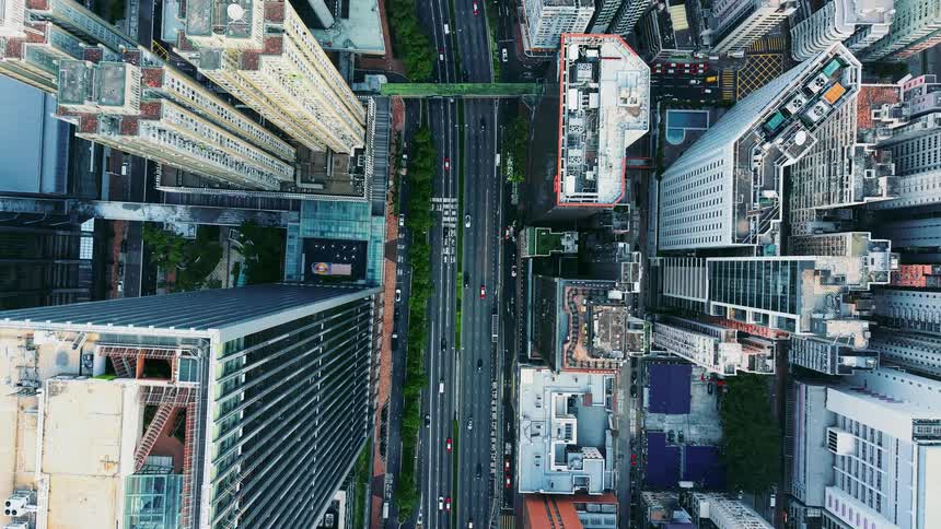 Aerial view of metropolitan towers with Office Towers and Road Activity