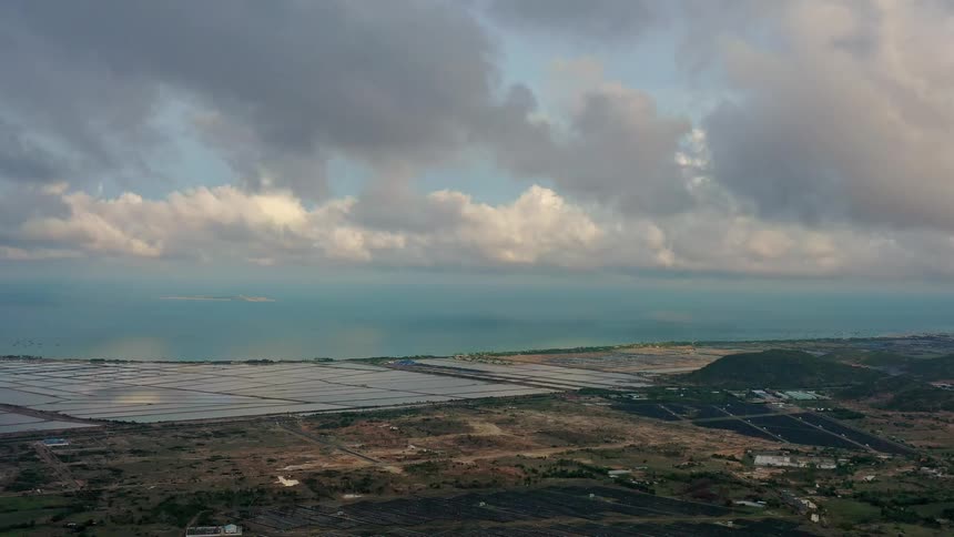 The landscape is covered with solar panels