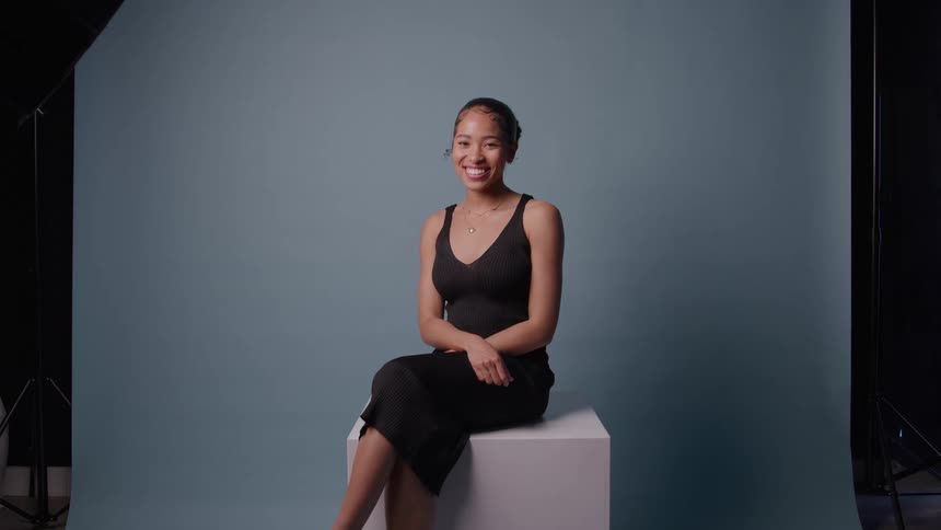 A portrait of a woman in a studio