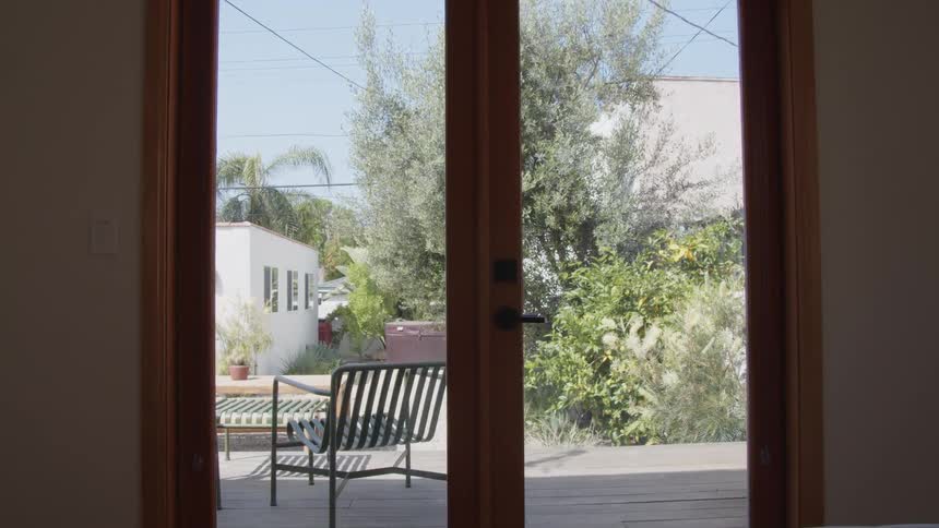 The glass door leads to the porch