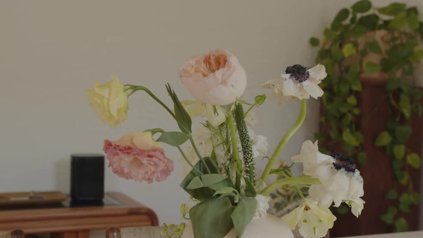 A bouquet of flowers is in the home