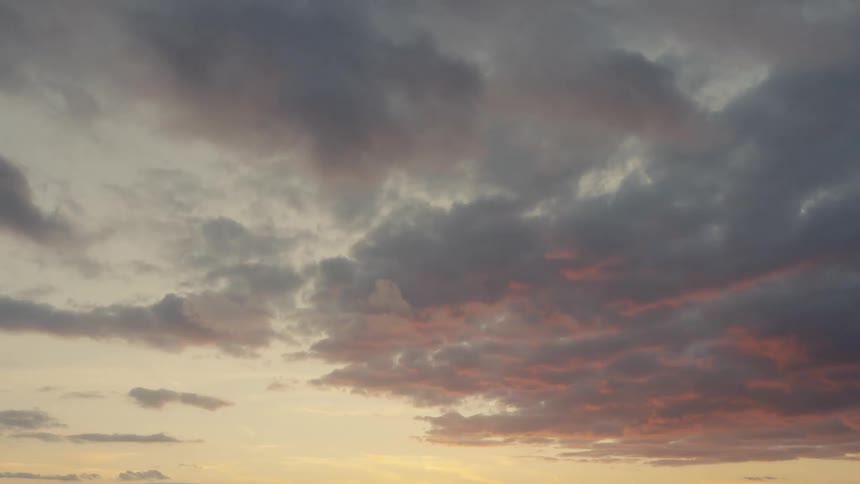 Clouds lit by the sunset in the sky