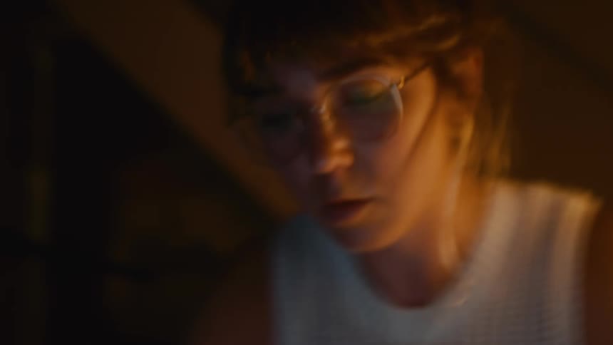 A woman in bed on her laptop