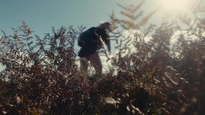 A woman hiking outdoors