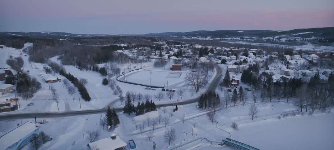 Snowcovered sports field in an urban area