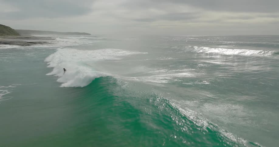 An aerial view of waves in the ocean