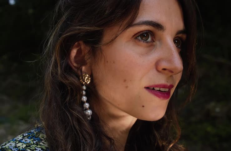 A portrait of a woman outdoors