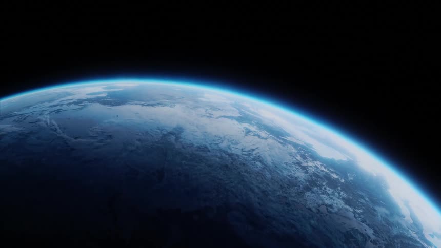 Cinematic space view reveals earths curvature with atmospheric glow and clouds over continents