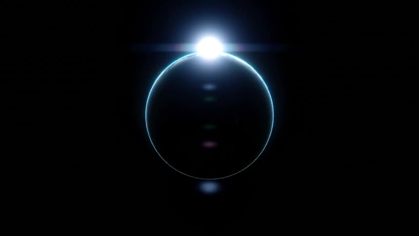 The sun sets behind the planet at night