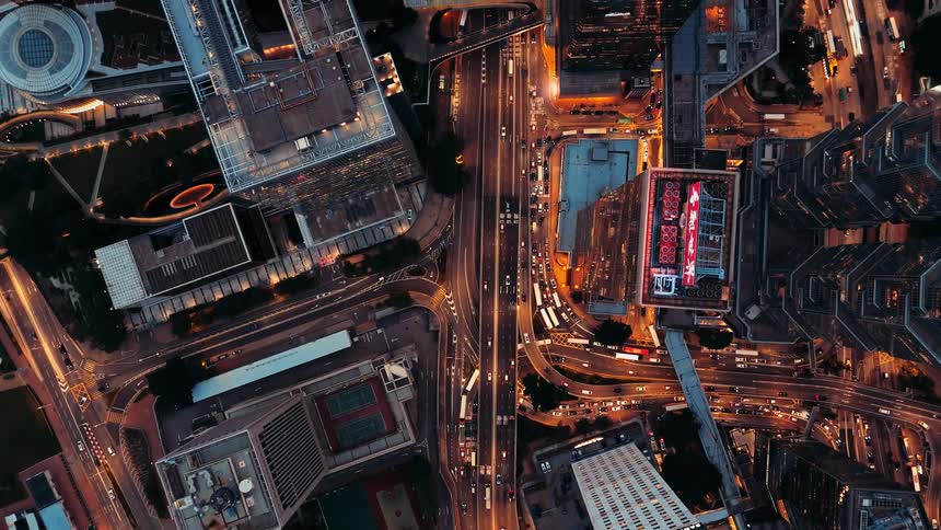 Traffic runs on the freeway in the city at night