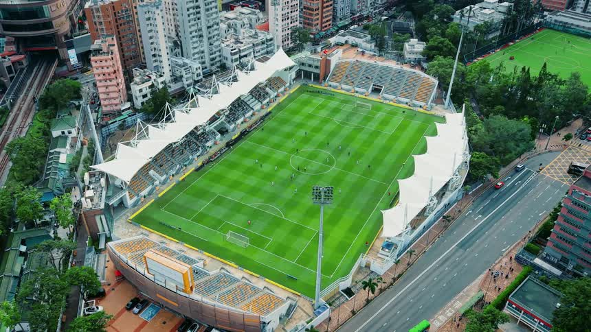 The players are running on the field during a game