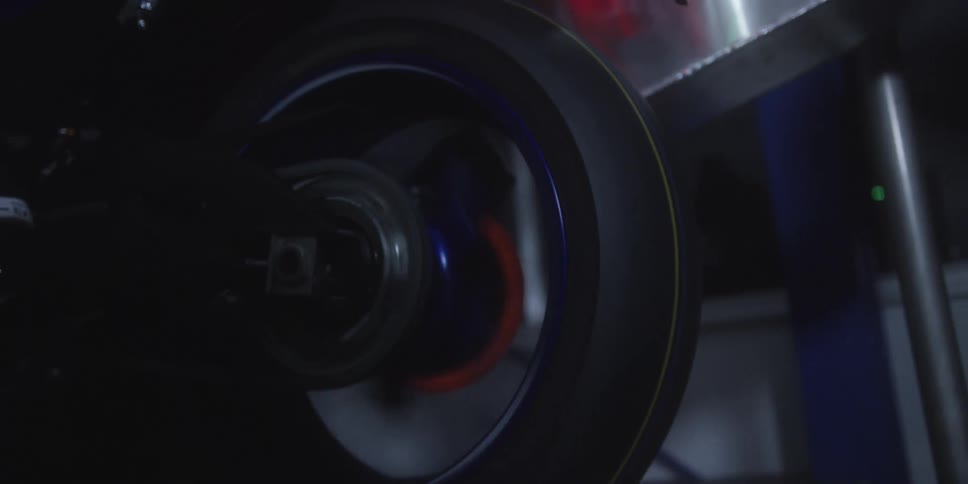 The wheel is spinning fast with a chain