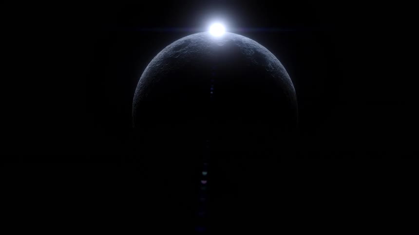 A bright light emerges from behind the dark cratered silhouette of a moon in deep space