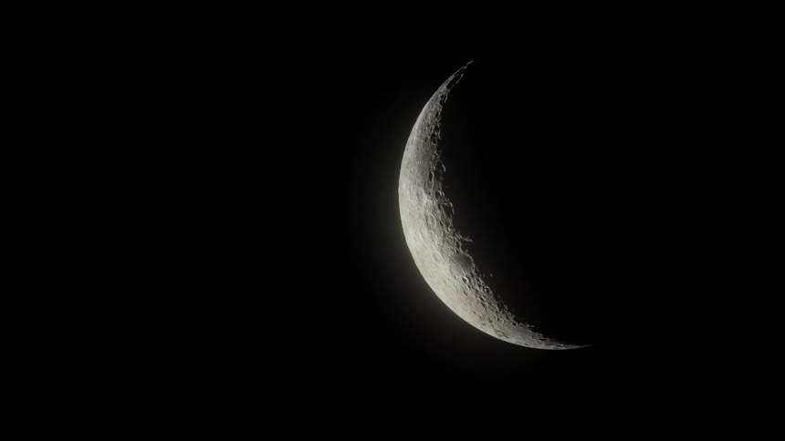 Waxing crescent moon with detailed surface highlighted against the dark sky