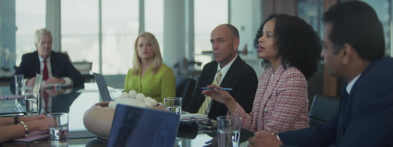 Women in board room meeting environment