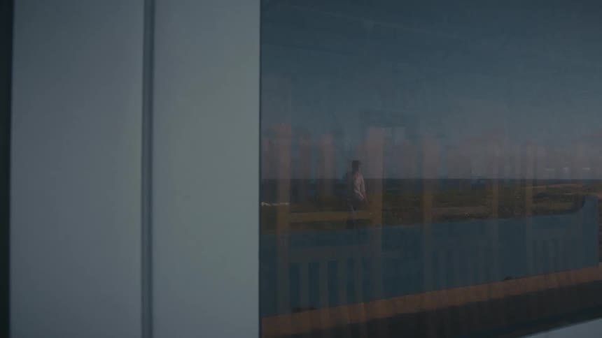 A person walking in a reflection