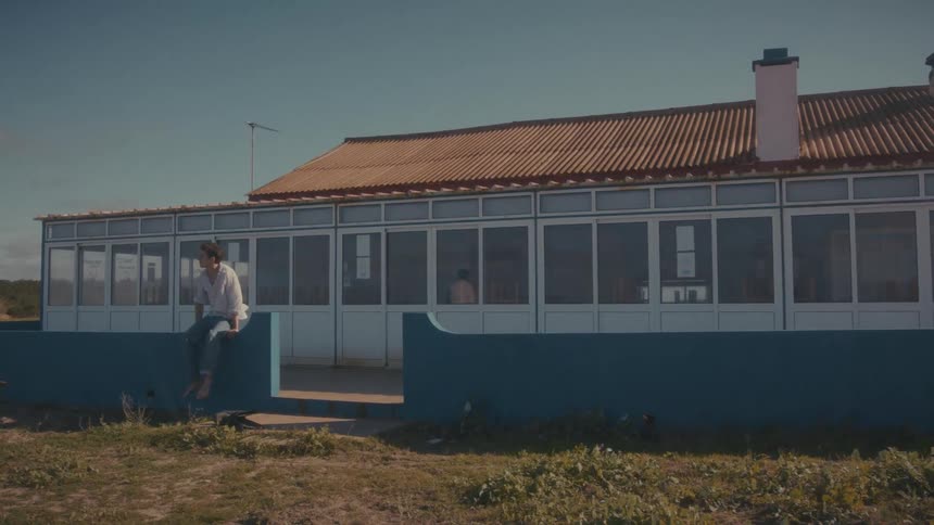 A man outside a house