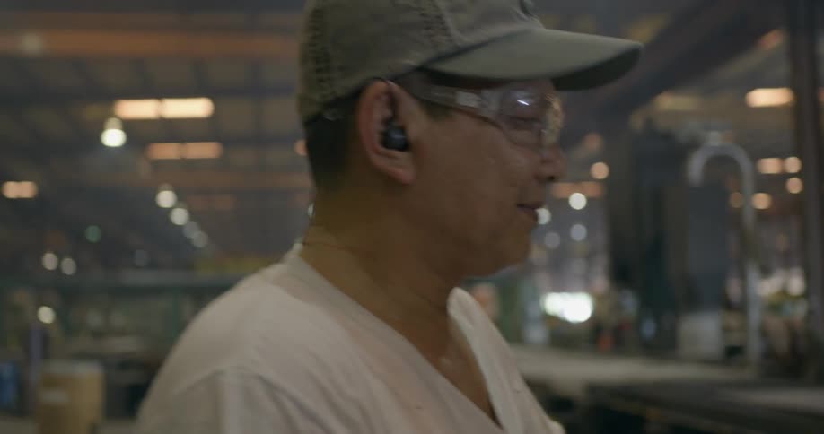 A man works in a factory