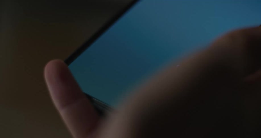 Hand answering a call screen on a smartphone
