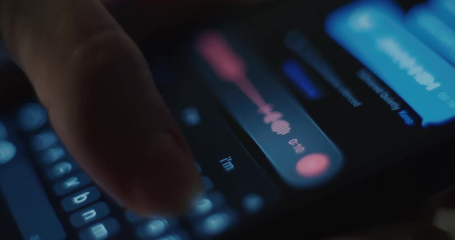 Woman uses the audio components of a smartphone app
