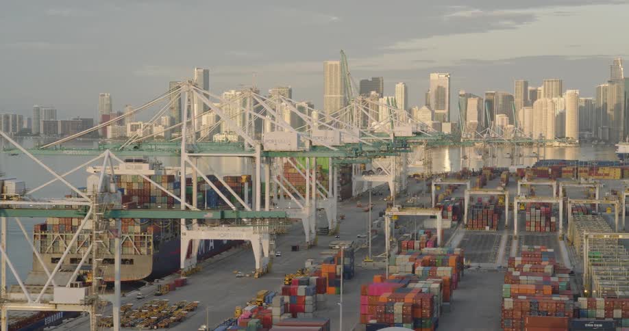 The port by the city is full of storage containers