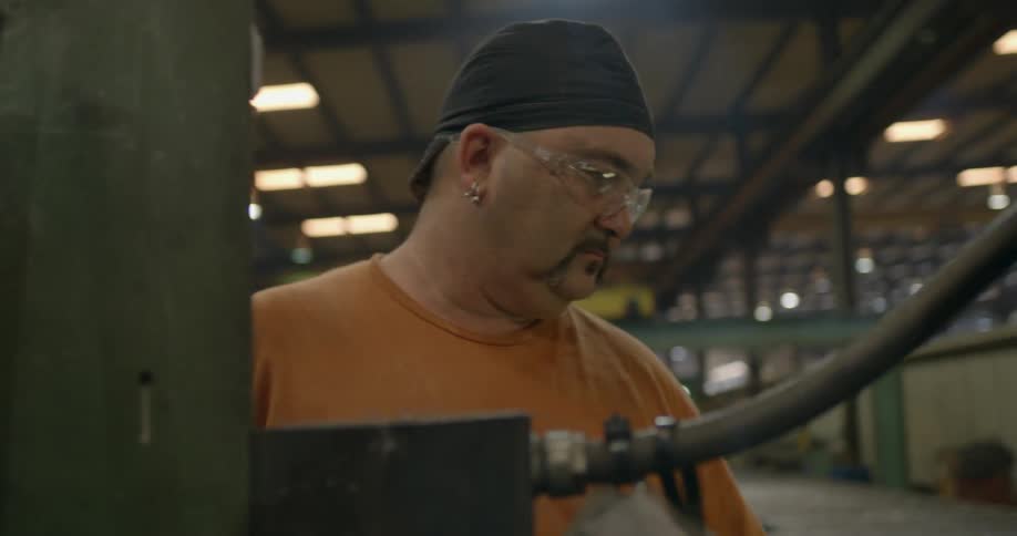 A man works in a factory