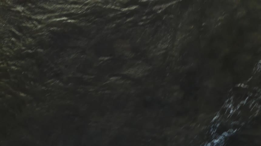The surface of a sea water flowing forward seen from above