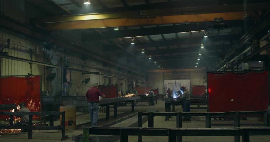 People work in a warehouse