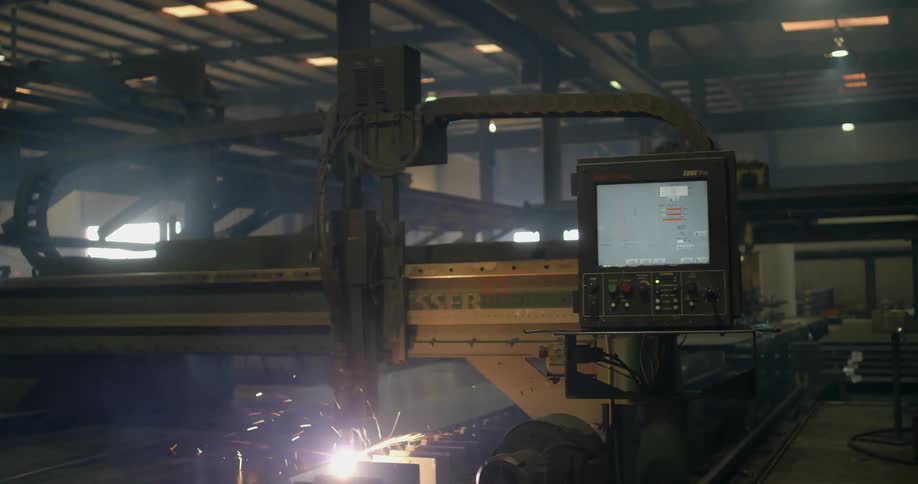 A machine in a factory creating sparks