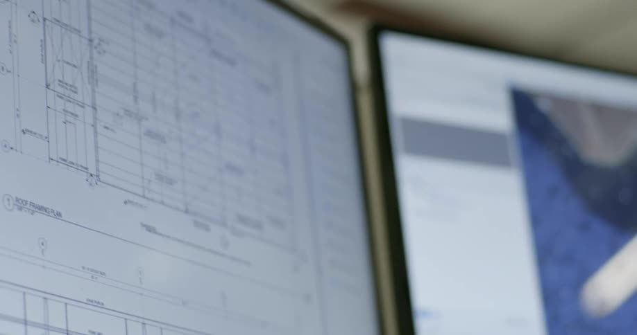 Close-up of two computer monitors