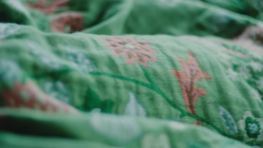 Person moving under the blanket