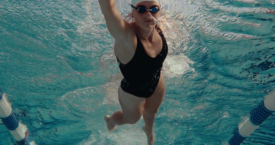 A woman swimming in a pool