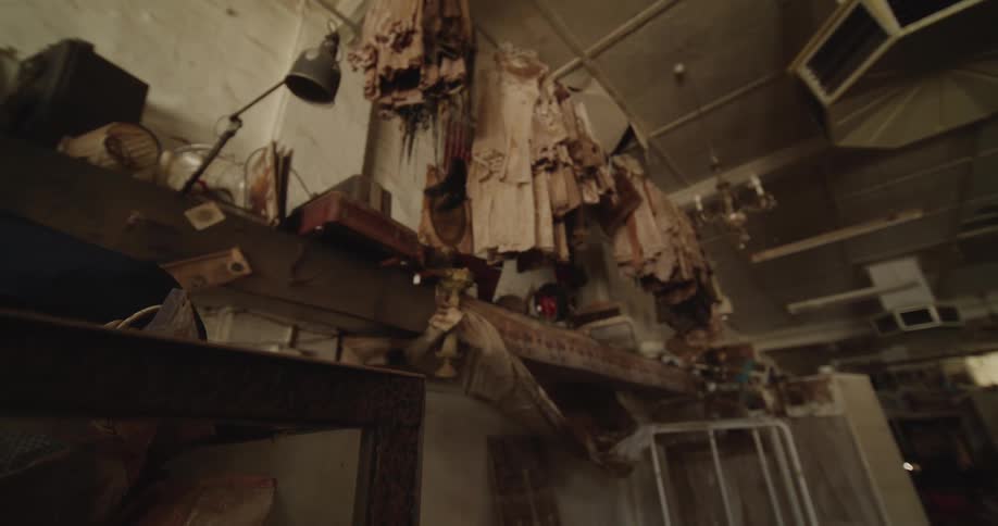 An abandoned apartment building filled with belongings and furniture