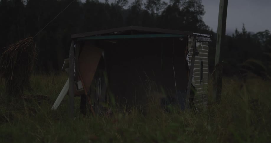 A view of a destroyed metal shed