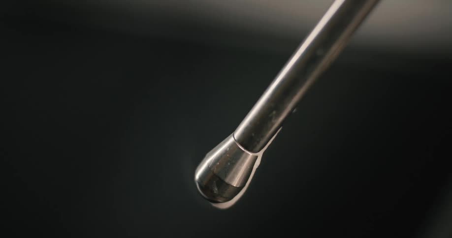 The metal rod is wet