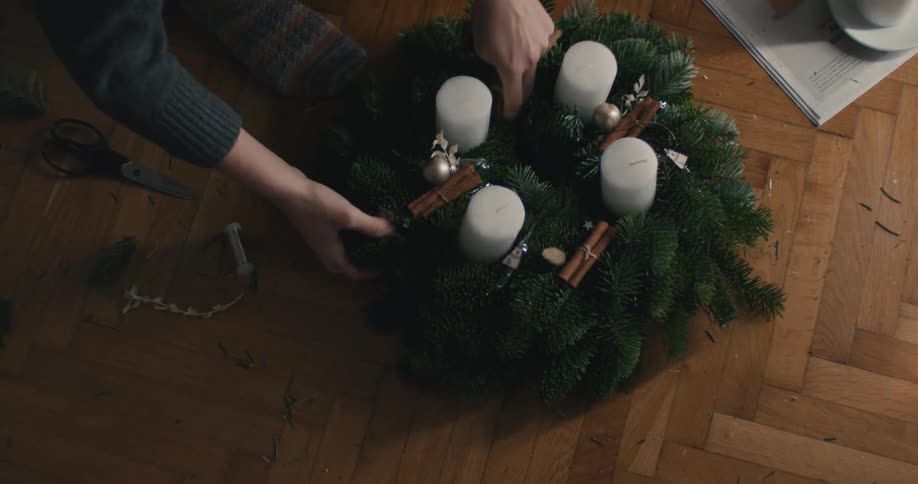 A person working on a wreath