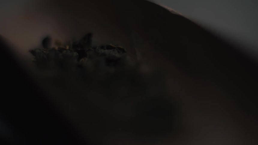 A close up of tea in a spoon