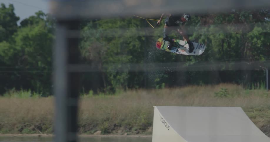 A man wakeboarding outdoors