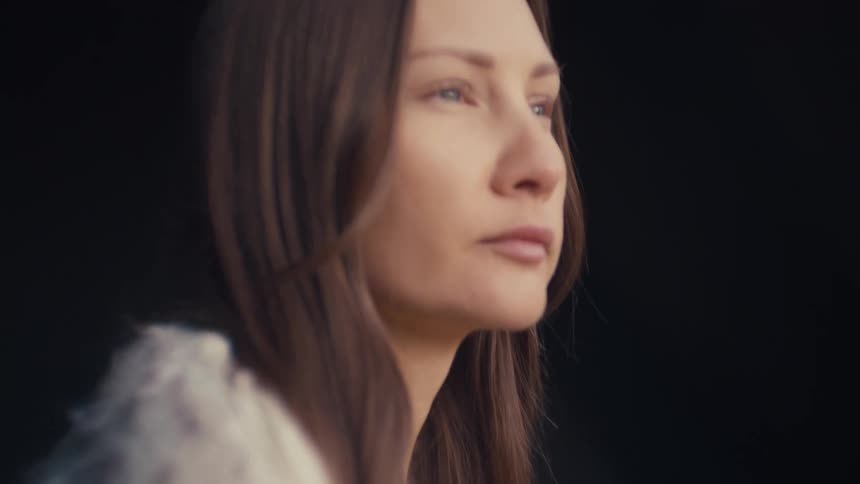 A portrait of a woman outdoors