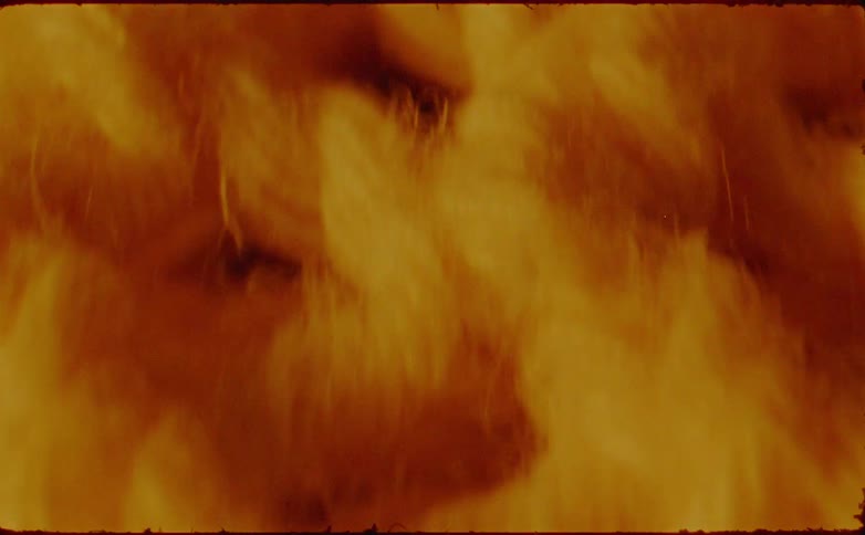 Thick coarse fibers of bright orange wool