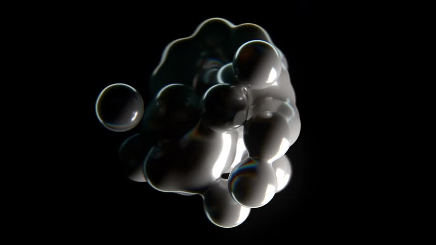 A seamless abstract animation of a cluster of glossy white and black merging liquid balls rotating against a solid black background