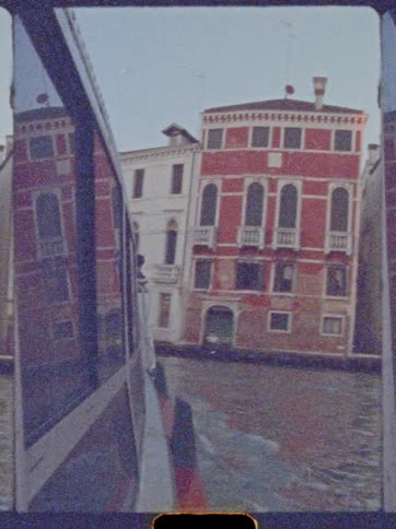 A view of city buildings along a canal