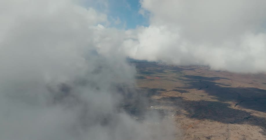 Heavy clouds obscure the rural countryside on a foggy day