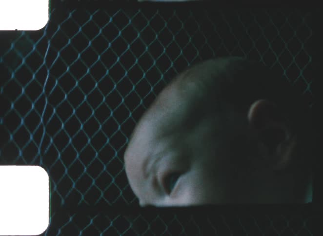 The baby moves around in the crib
